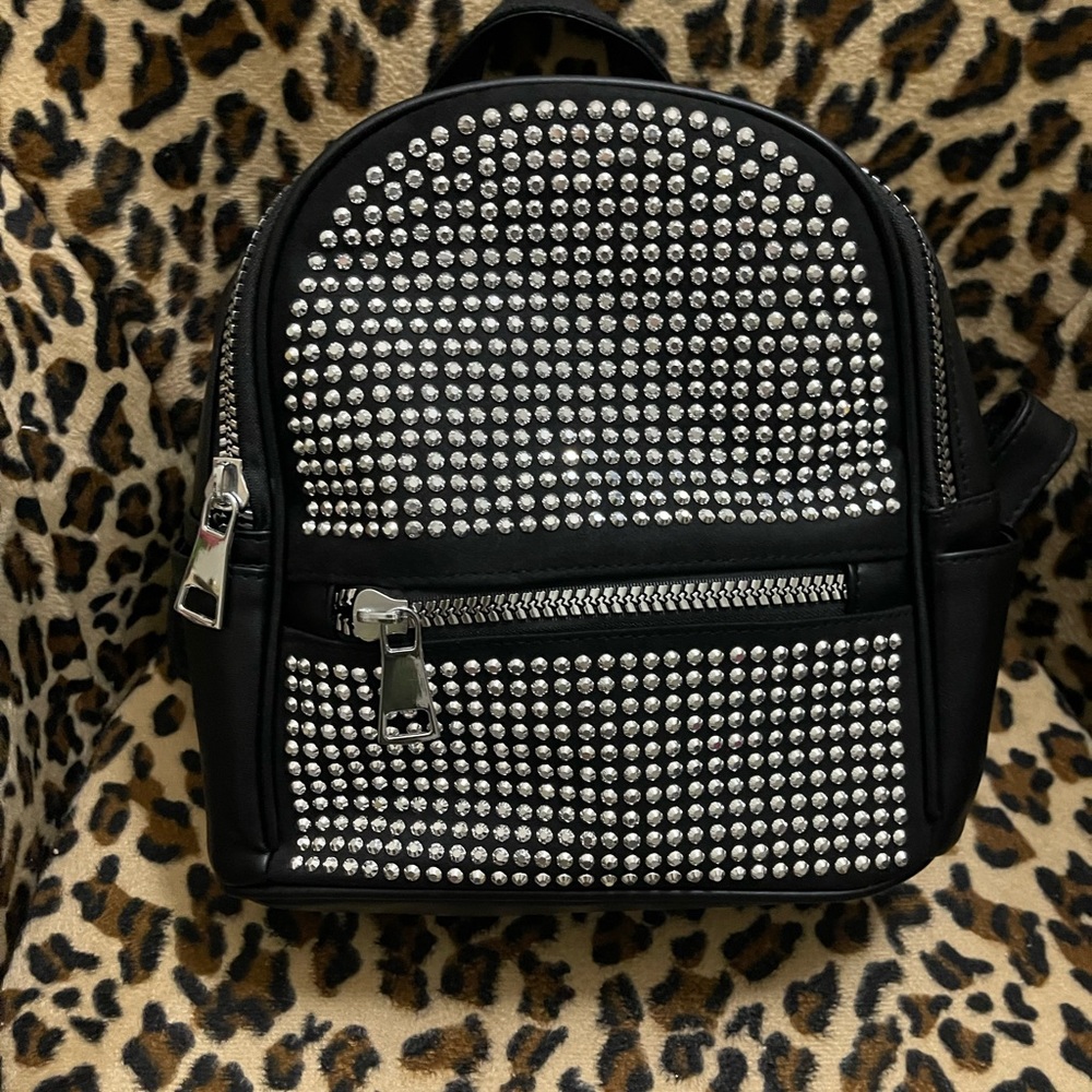 Super cute trendy, bedazzled, backpack, purse Brand new, never worn.